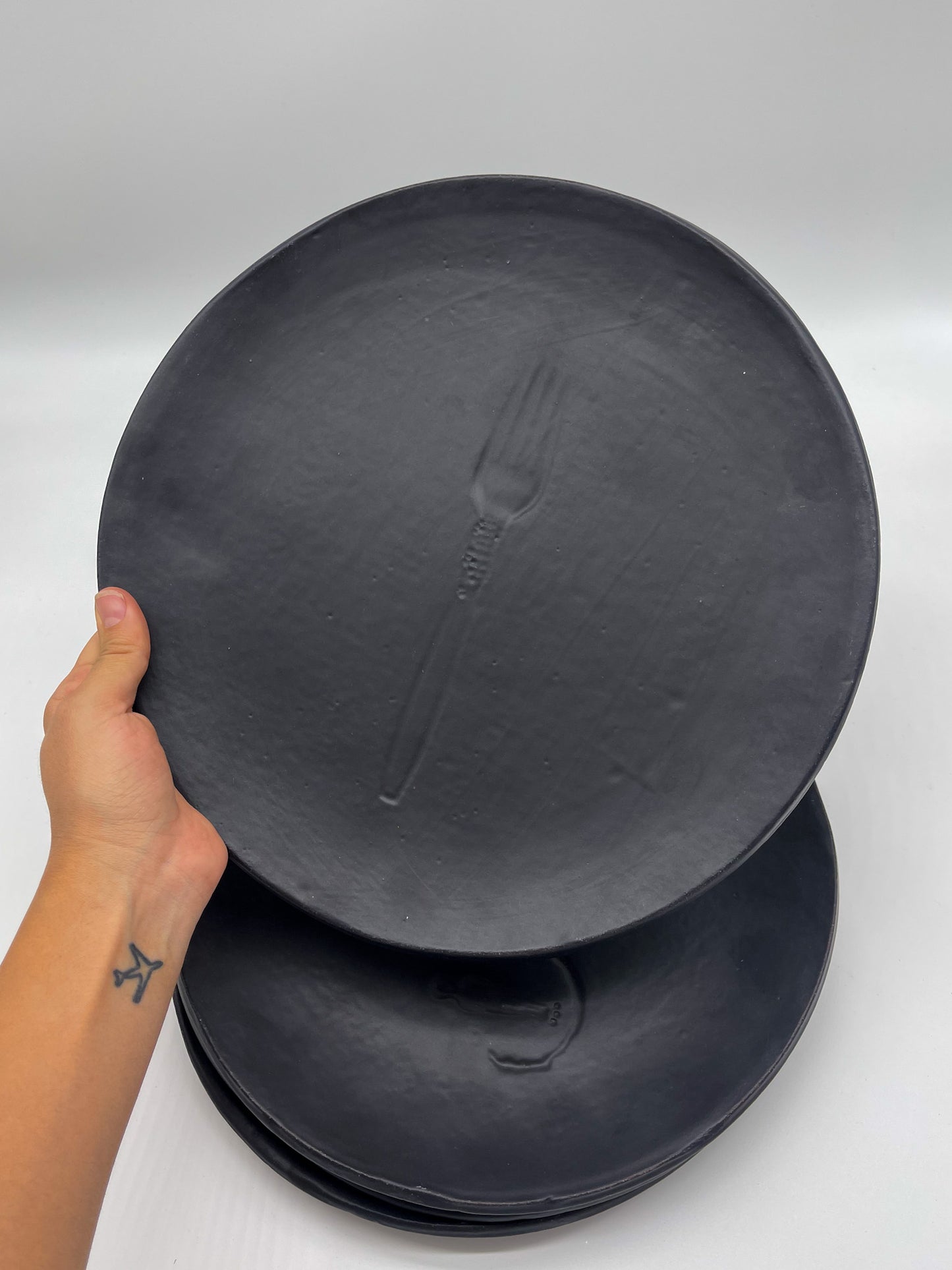 Round Dinner Plates - Black imprint on plate