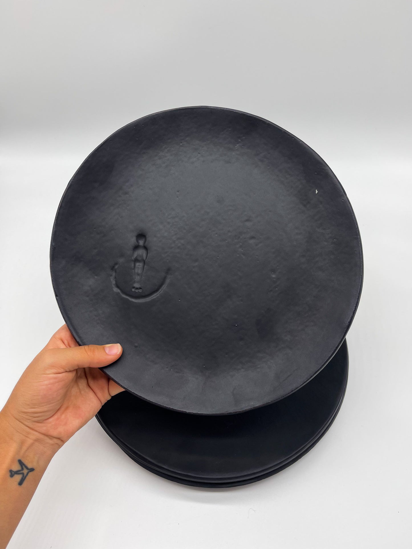 Round Dinner Plates - Black imprint on plate