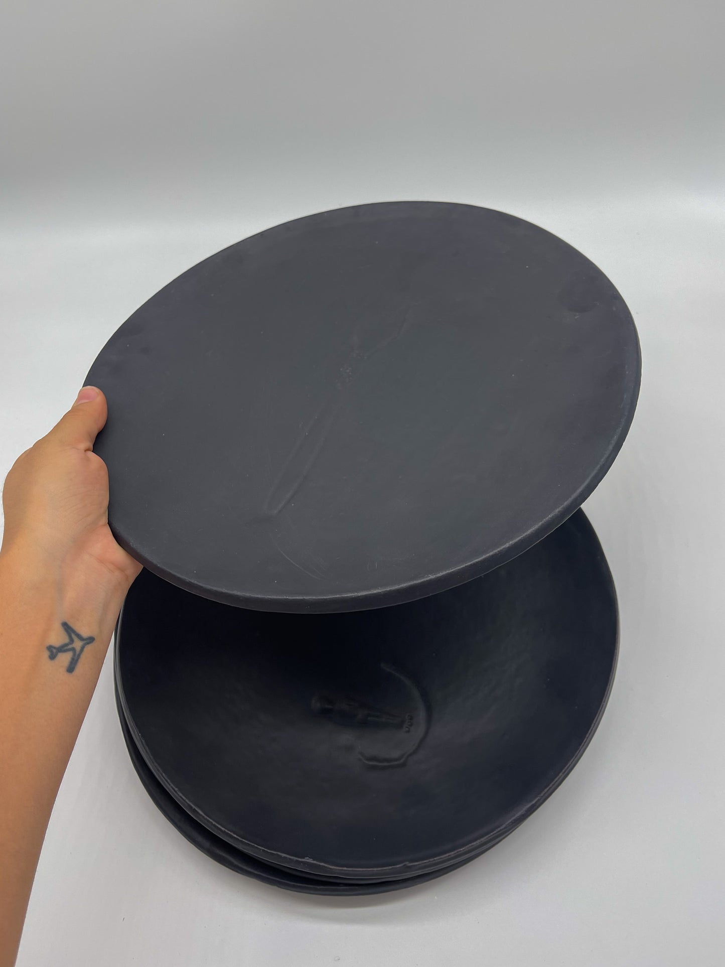 Round Dinner Plates - Black imprint on plate